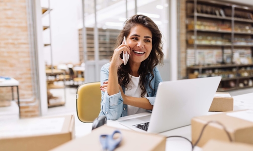 Business woman on phone and laptop